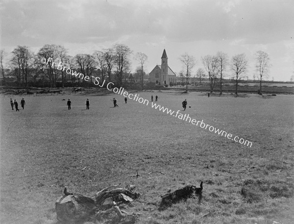 SPORTS DAY RUNNERS WITH R.C. CHURCH IN BACKGROUND